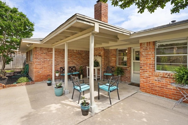 view of patio / terrace with fence