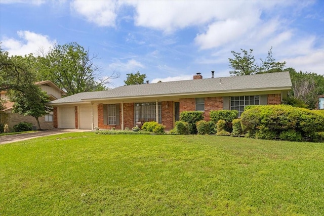 ranch-style home with a front yard, an attached garage, and driveway