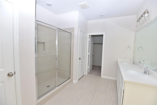 925 Plaza Ln, Argyle, TX 76226 - bathroom with a stall shower, visible vents, a sink, and double vanity