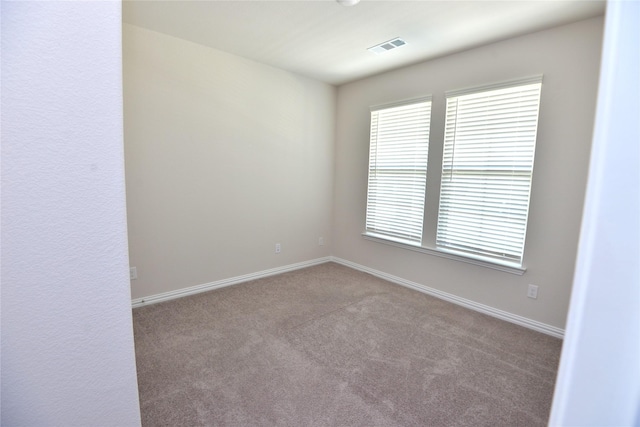 925 Plaza Ln, Argyle, TX 76226 - empty room featuring carpet flooring, baseboards, and visible vents