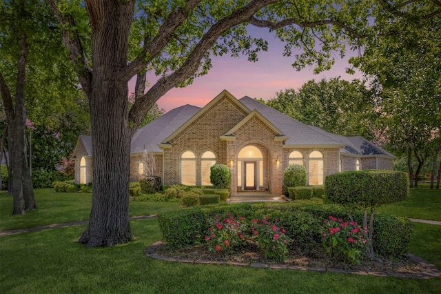 6200 Forest River Dr, Fort Worth, TX 76112 - ranch-style house with a yard, roof with shingles, and brick siding