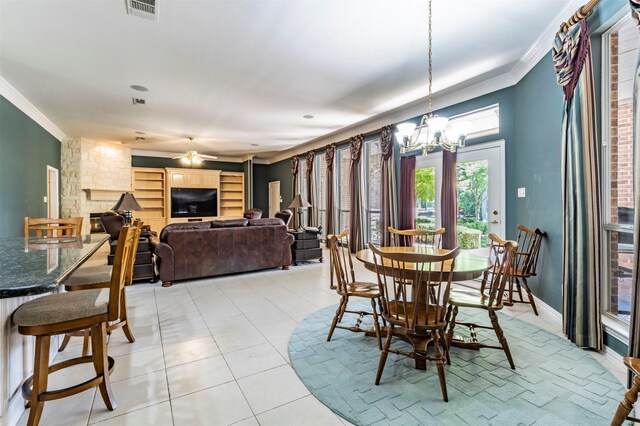 6200 Forest River Dr, Fort Worth, TX 76112 - dining room with crown molding, light tile patterned floors, visible vents, and ceiling fan with notable chandelier