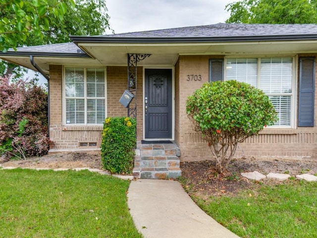 3703 Clover Ln, Dallas, TX 75220 - entrance to property featuring brick siding and a lawn