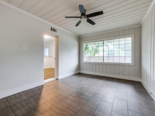 3703 Clover Ln, Dallas, TX 75220 - tiled empty room featuring ornamental molding, visible vents, baseboards, and ceiling fan