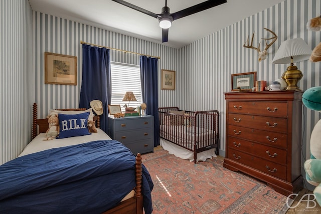7001 Breezeway Dr, Abilene, TX 79606 - bedroom with ceiling fan and wallpapered walls