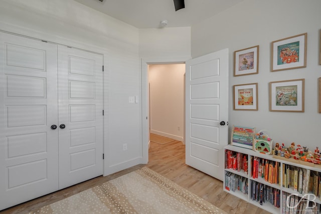 7001 Breezeway Dr, Abilene, TX 79606 - rec room with baseboards and wood finished floors