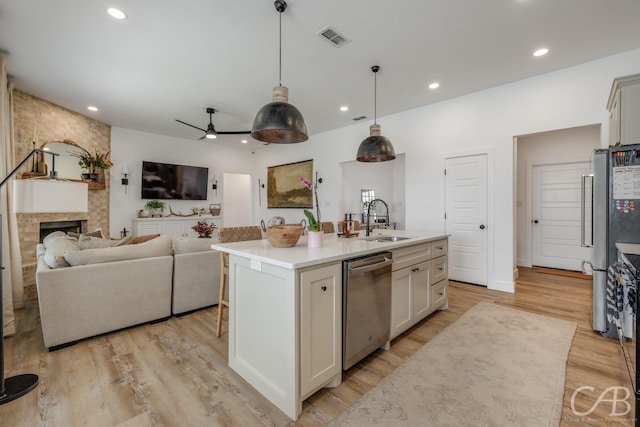 7001 Breezeway Dr, Abilene, TX 79606 - kitchen with a sink, recessed lighting, visible vents, and dishwasher