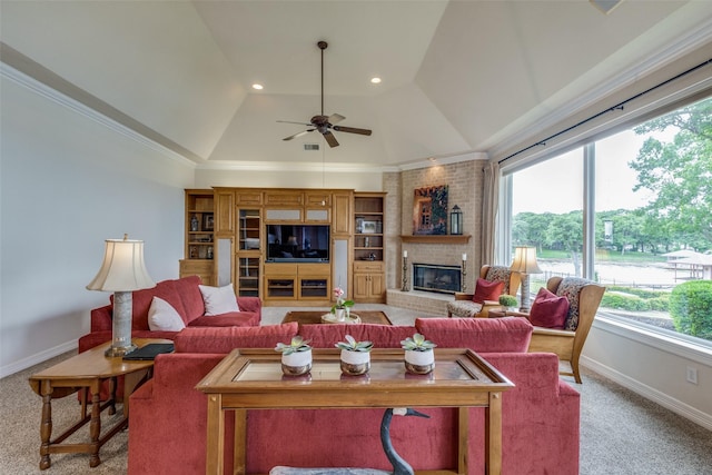 living room featuring lofted ceiling, light colored carpet, a fireplace, baseboards, and ceiling fan