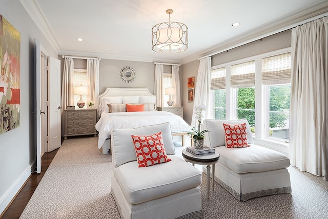 bedroom with baseboards, ornamental molding, and recessed lighting