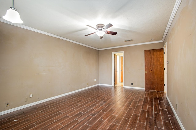 122 Big Bend Blvd, Waxahachie, TX 75165 - empty room featuring a ceiling fan, dark wood finished floors, ornamental molding, and baseboards