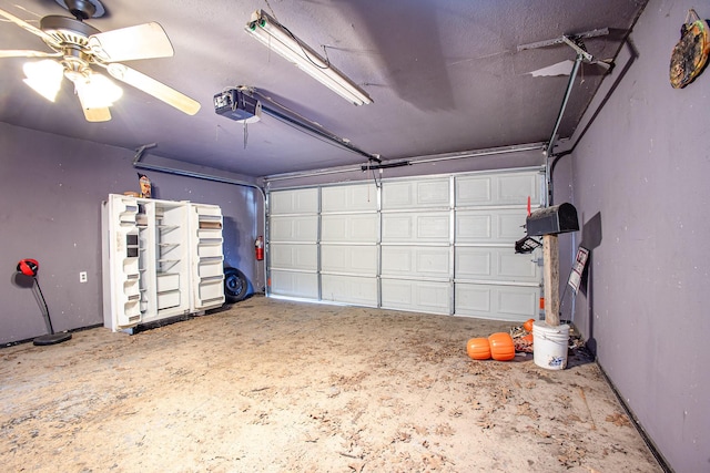 122 Big Bend Blvd, Waxahachie, TX 75165 - garage with a garage door opener and a ceiling fan