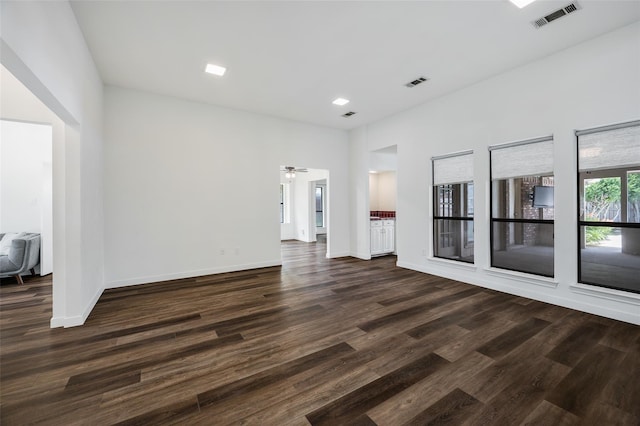 1413 Pecan Creek Dr, Garland, TX 75044 - unfurnished living room featuring baseboards, a ceiling fan, visible vents, and dark wood-style floors