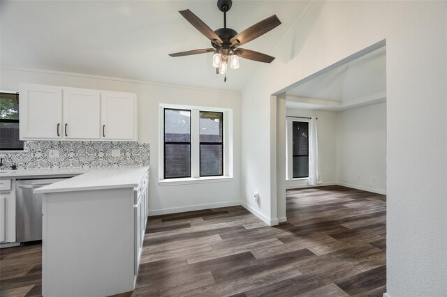 1413 Pecan Creek Dr, Garland, TX 75044 - kitchen featuring a ceiling fan, stainless steel dishwasher, dark wood-style flooring, white cabinetry, and light countertops