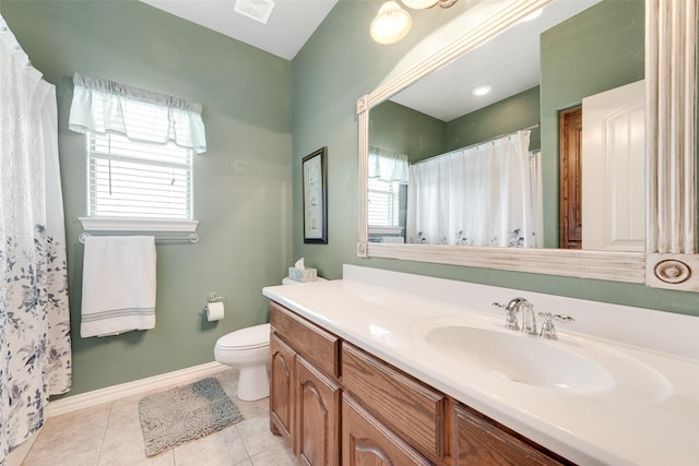 full bath featuring vanity, a wealth of natural light, visible vents, and toilet