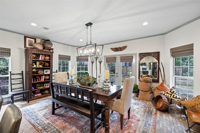3517 Woods Blvd, Tyler, TX 75707 - dining room with crown molding, wood-type flooring, a chandelier, and recessed lighting