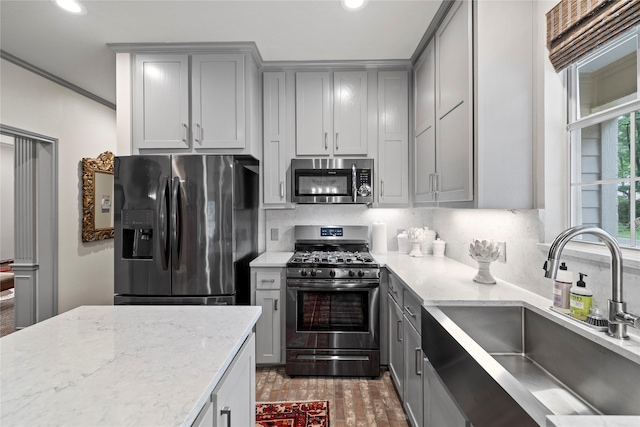 3517 Woods Blvd, Tyler, TX 75707 - kitchen with a sink, recessed lighting, gray cabinets, and appliances with stainless steel finishes