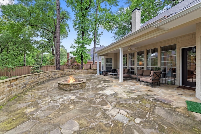 3517 Woods Blvd, Tyler, TX 75707 - view of patio / terrace with a fenced backyard, an outdoor fire pit, and a ceiling fan