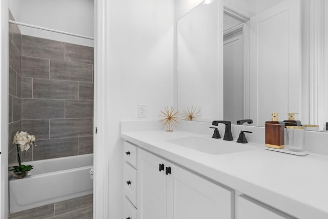 full bathroom featuring vanity and washtub / shower combination