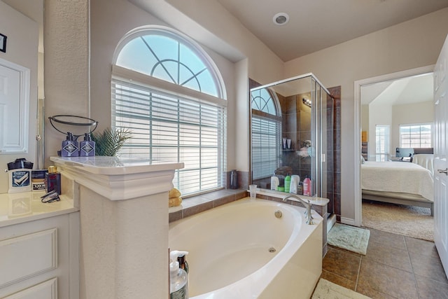 1433 Ocotillo Ln, Fort Worth, TX 76177 - bathroom featuring a garden tub, ensuite bathroom, a shower stall, and tile patterned flooring