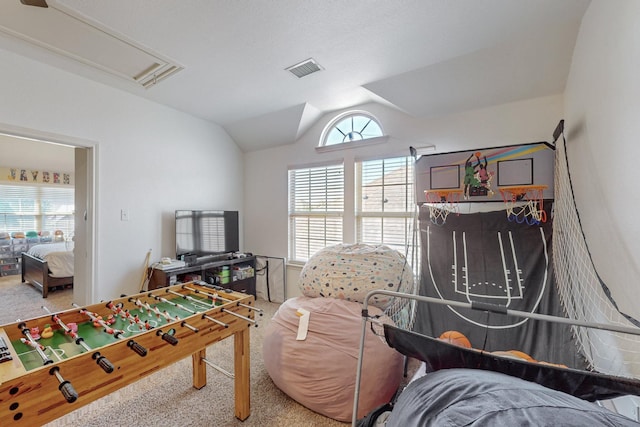 1433 Ocotillo Ln, Fort Worth, TX 76177 - game room featuring carpet floors, vaulted ceiling, healthy amount of natural light, and attic access