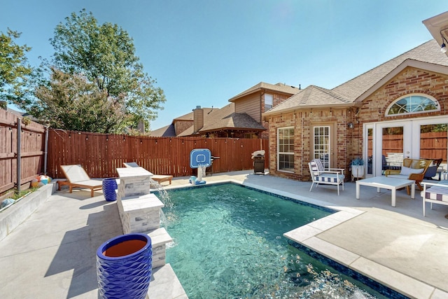 1433 Ocotillo Ln, Fort Worth, TX 76177 - view of pool featuring a patio area, a fenced backyard, and a grill