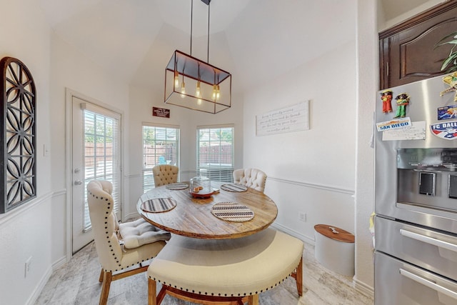 1433 Ocotillo Ln, Fort Worth, TX 76177 - dining room featuring plenty of natural light, baseboards, vaulted ceiling, and a chandelier