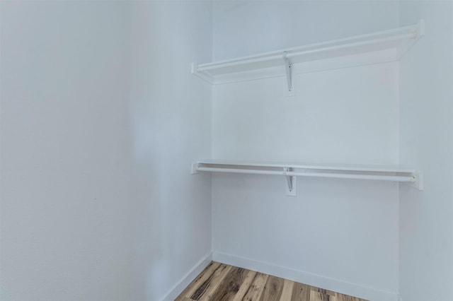 1014 Trinity St, Cleburne, TX 76031 - walk in closet with light wood finished floors