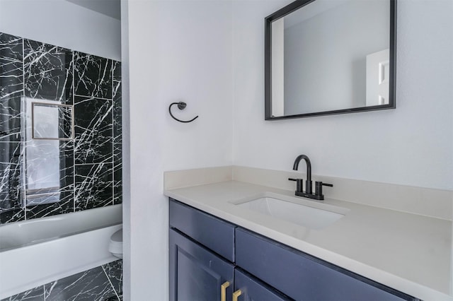 1014 Trinity St, Cleburne, TX 76031 - full bathroom with marble finish flooring, vanity, toilet, and shower / washtub combination