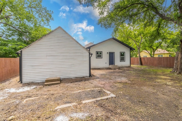 1014 Trinity St, Cleburne, TX 76031 - back of house with entry steps and a fenced backyard