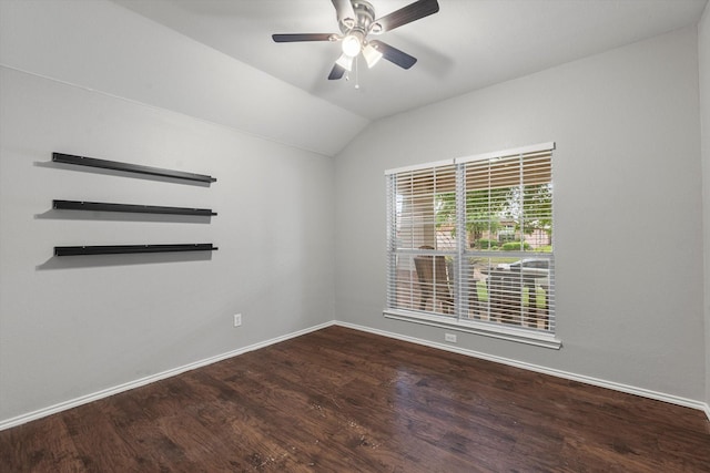 unfurnished room featuring vaulted ceiling, ceiling fan, baseboards, and wood finished floors