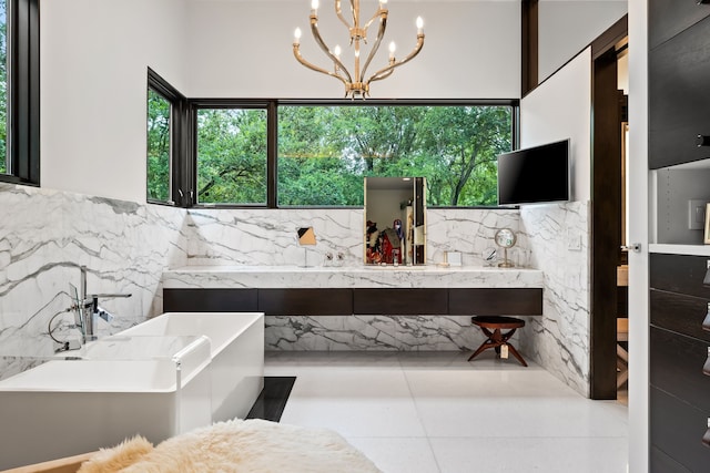 6124 Saint Andrews Dr, University Park, TX 75205 - full bathroom with a chandelier, tile walls, a freestanding bath, and vanity