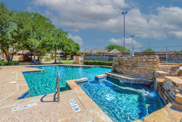 1200 Harwell Dr Unit 1924, Arlington, TX 76011 - community pool with a community hot tub