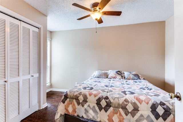 1200 Harwell Dr Unit 1924, Arlington, TX 76011 - bedroom featuring a closet, baseboards, multiple windows, a textured ceiling, and ceiling fan