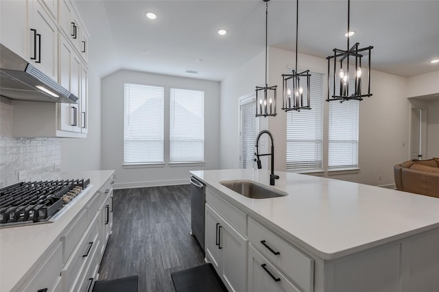3509 Mescalbean Dr, Mckinney, TX 75071 - kitchen featuring a sink, stainless steel appliances, backsplash, under cabinet range hood, and light countertops