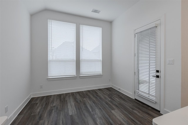 3509 Mescalbean Dr, Mckinney, TX 75071 - unfurnished dining area featuring vaulted ceiling, visible vents, dark wood-style flooring, and baseboards