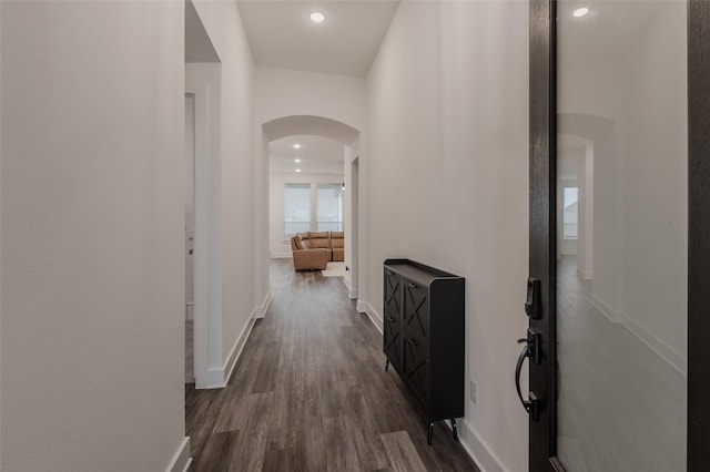 3509 Mescalbean Dr, Mckinney, TX 75071 - hall with arched walkways, dark wood-type flooring, baseboards, and recessed lighting