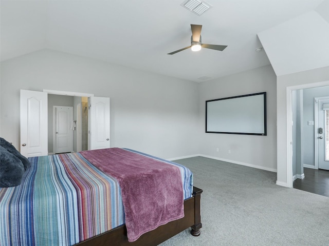 bedroom with visible vents, vaulted ceiling, ceiling fan, carpet flooring, and baseboards
