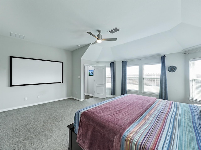 carpeted bedroom with ceiling fan, lofted ceiling, baseboards, and visible vents