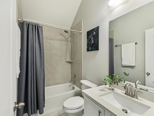 bathroom featuring toilet, lofted ceiling, vanity, tile patterned floors, and shower / bathtub combination with curtain