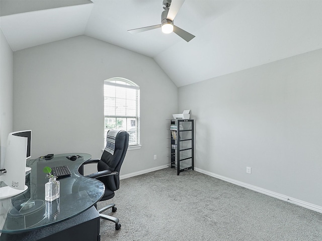 carpeted office featuring ceiling fan, lofted ceiling, and baseboards