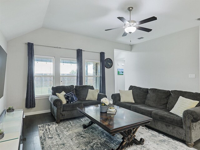 living area featuring lofted ceiling, wood finished floors, visible vents, ceiling fan, and baseboards