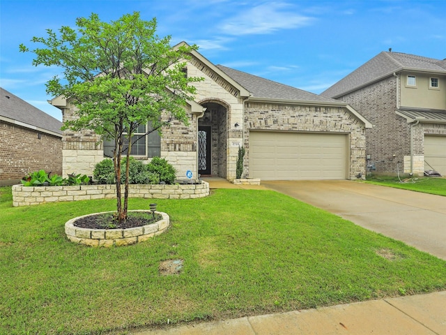 french country style house featuring an attached garage, brick siding, driveway, and a front yard
