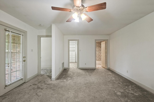 2020 Sauls Ln, Denton, TX 76209 - unfurnished bedroom with visible vents, ceiling fan, carpet floors, baseboards, and access to exterior