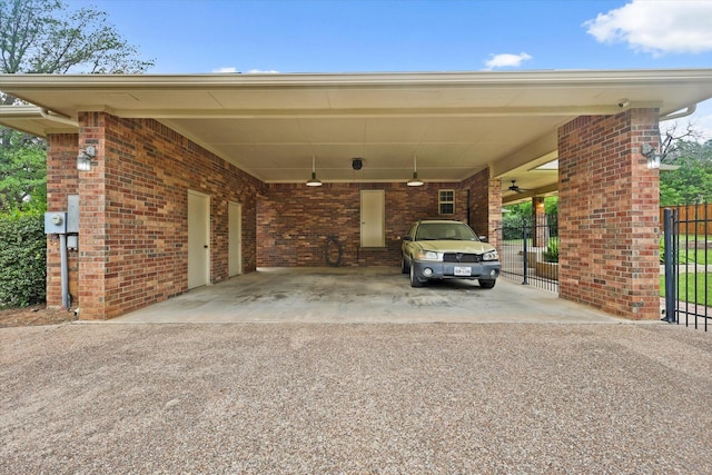 2020 Sauls Ln, Denton, TX 76209 - view of parking with driveway, fence, a gate, and an attached carport
