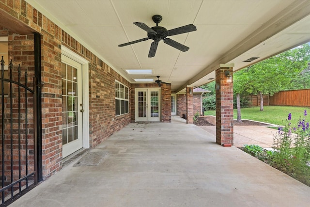 2020 Sauls Ln, Denton, TX 76209 - view of patio / terrace with french doors, ceiling fan, and fence
