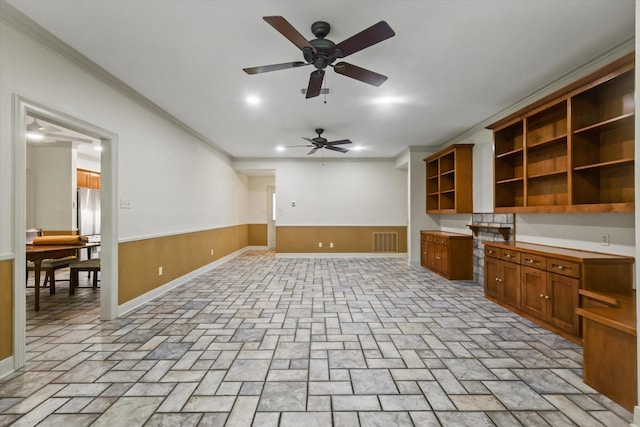 2020 Sauls Ln, Denton, TX 76209 - kitchen with a ceiling fan, brown cabinetry, ornamental molding, visible vents, and open shelves