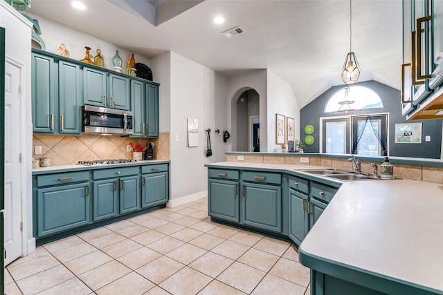 7916 Stansfield Dr, Fort Worth, TX 76137 - kitchen featuring light countertops, stainless steel appliances, decorative backsplash, and a sink