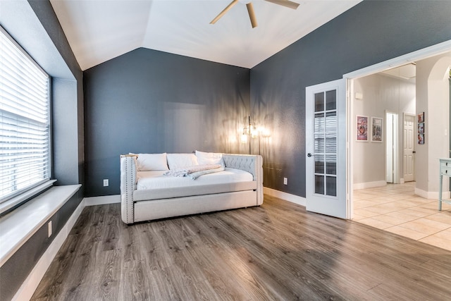 7916 Stansfield Dr, Fort Worth, TX 76137 - living area featuring lofted ceiling, a wealth of natural light, a ceiling fan, and wood finished floors