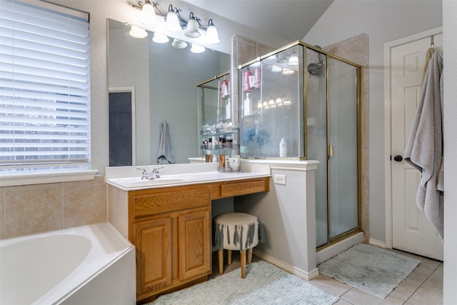 7916 Stansfield Dr, Fort Worth, TX 76137 - bathroom featuring a stall shower, tile patterned flooring, a garden tub, and vanity
