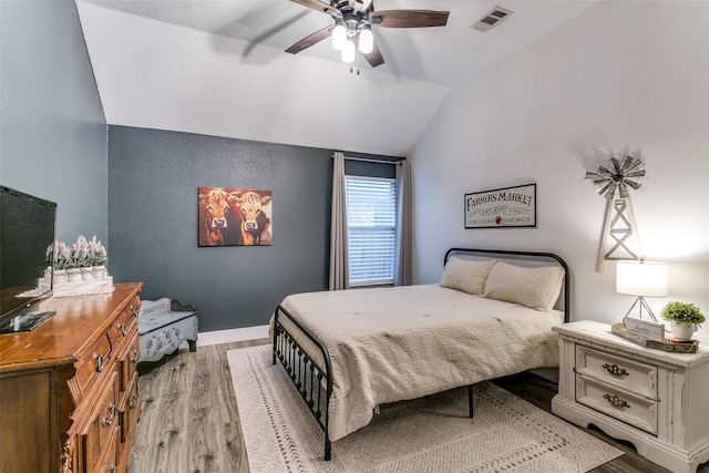 7916 Stansfield Dr, Fort Worth, TX 76137 - bedroom with visible vents, baseboards, ceiling fan, light wood-style floors, and vaulted ceiling